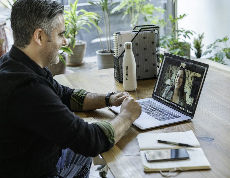 Care team member working at a laptop